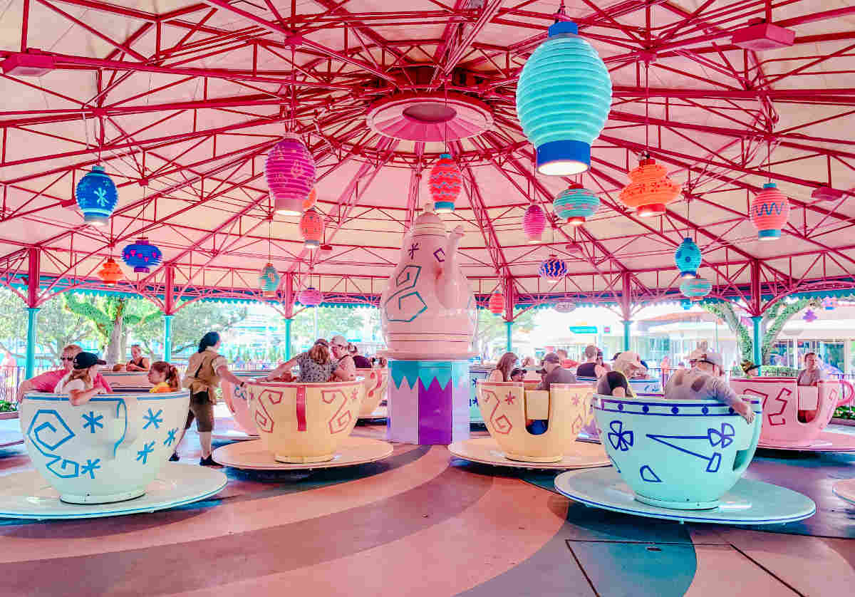 Pastel colored tea cups you sit in that spin when the ride starts